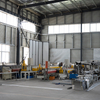 En forma de L alrededor de la puerta del hangar de la esquina