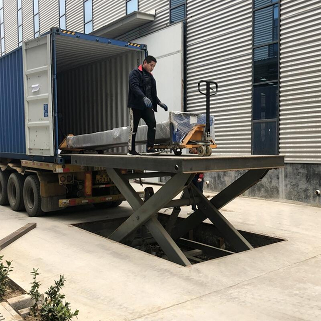 Nivelador de muelle tipo tijera