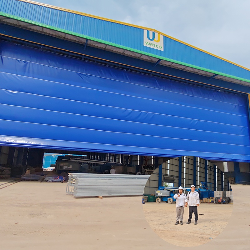 PUERTA DE HANGAR DE LIBRA VERTICA DE TELA PVC