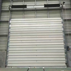 Puerta seccional industrial de gran tamaño con aislamiento a prueba de viento y nervaduras